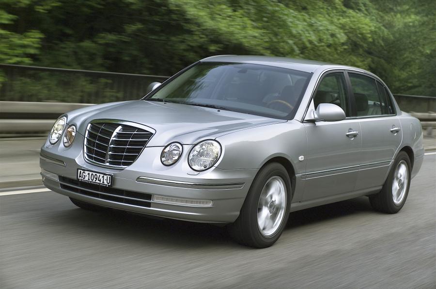  Kia Opirus 2003 года  (фото 48 из 54)